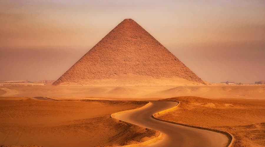 The Red Pyramid in Dahshur Egypt with its distinctive reddish limestone blocks
